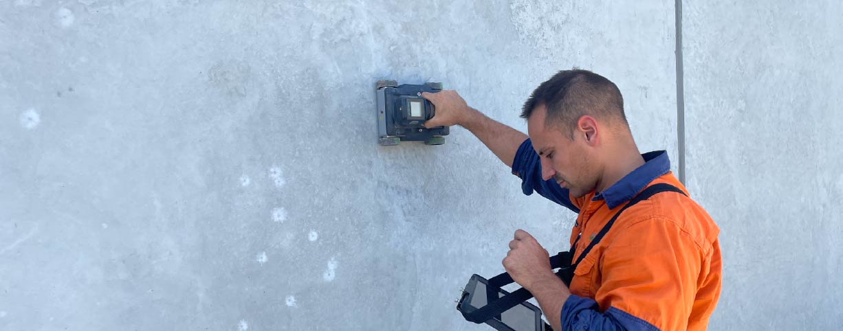 GPR scanning equipment detecting rebar and conduits in a concrete slab on site